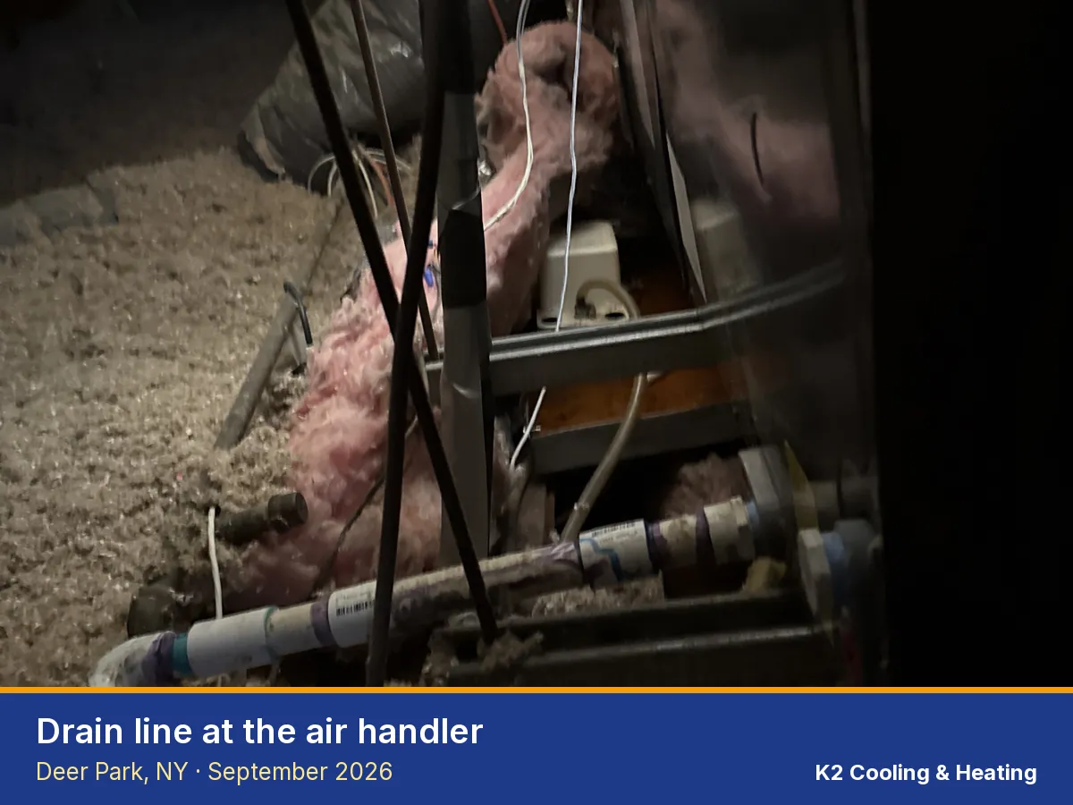 Air handler drain line in a Deer Park attic