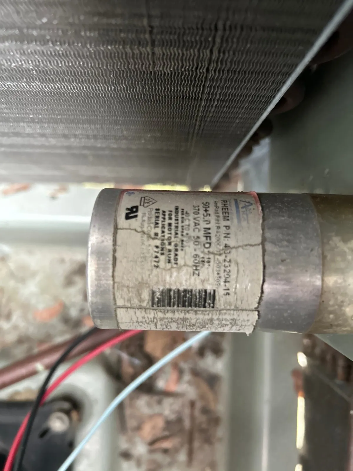 Run capacitor tested during an AC tune-up, Bay Shore NY