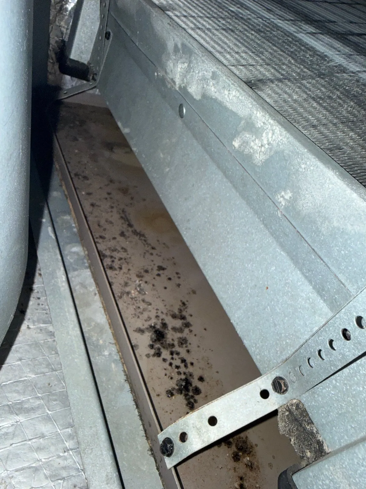 Inside of the condenser base before cleaning, Deer Park NY