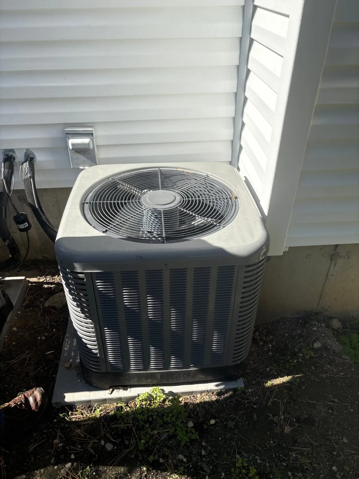 Outdoor air conditioning condenser at the same home, Deer Park NY