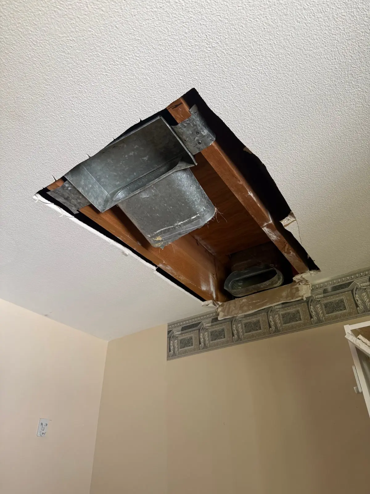 Attic opening during the air handler and duct replacement, Dix Hills NY