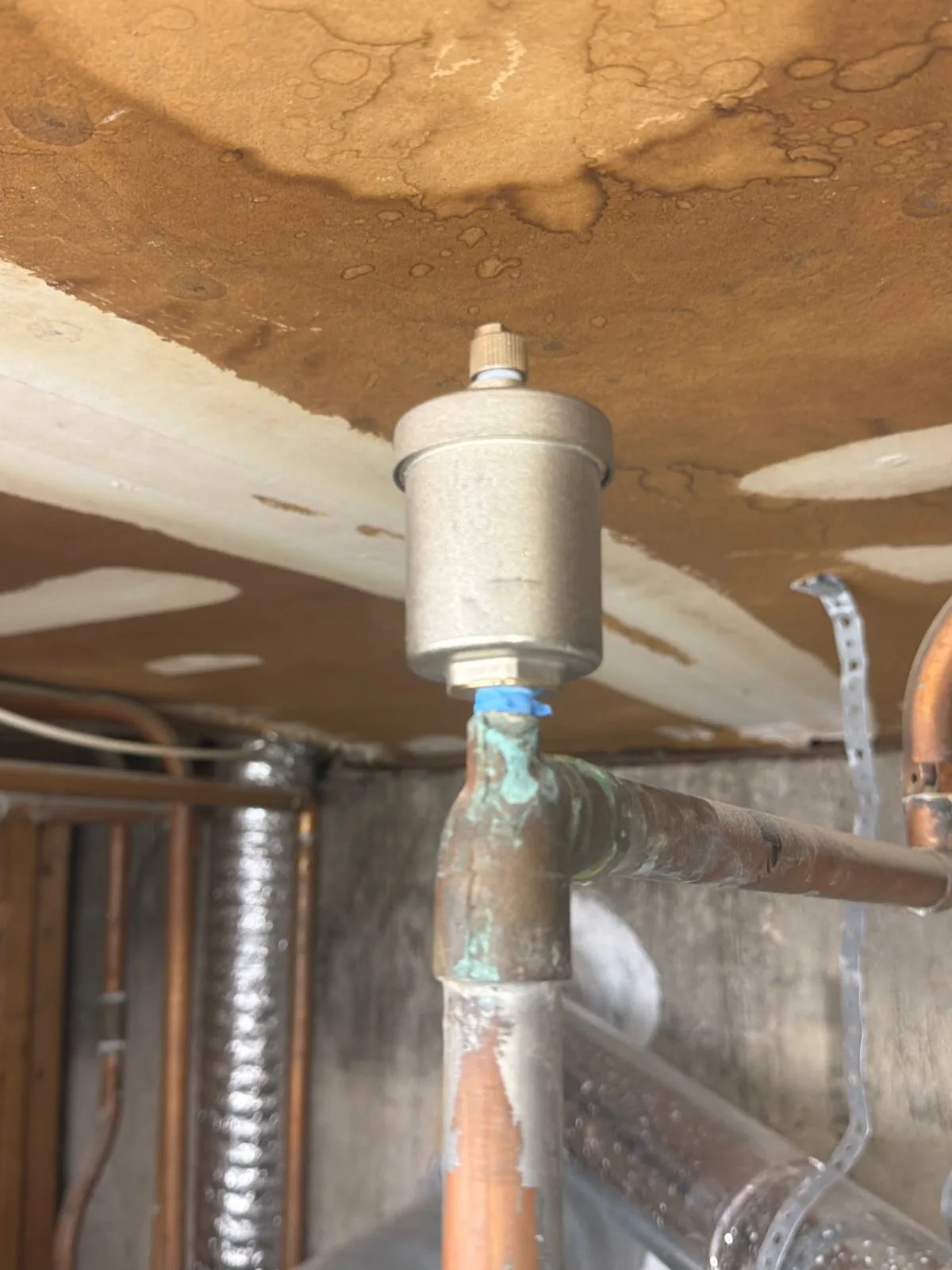 New automatic air bleeder on the heating piping, Dix Hills NY