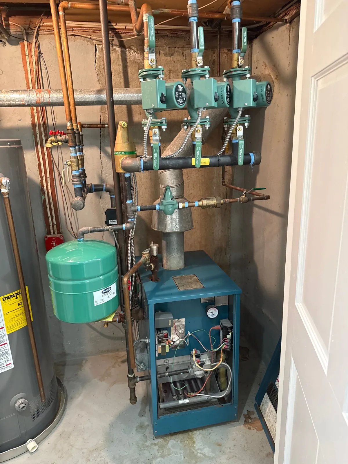 Three-zone gas boiler with zone valves in a Dix Hills basement