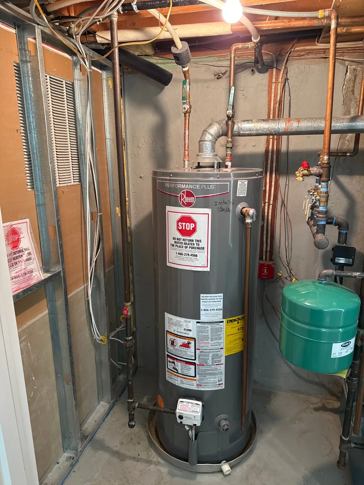Gas water heater in a Dix Hills basement