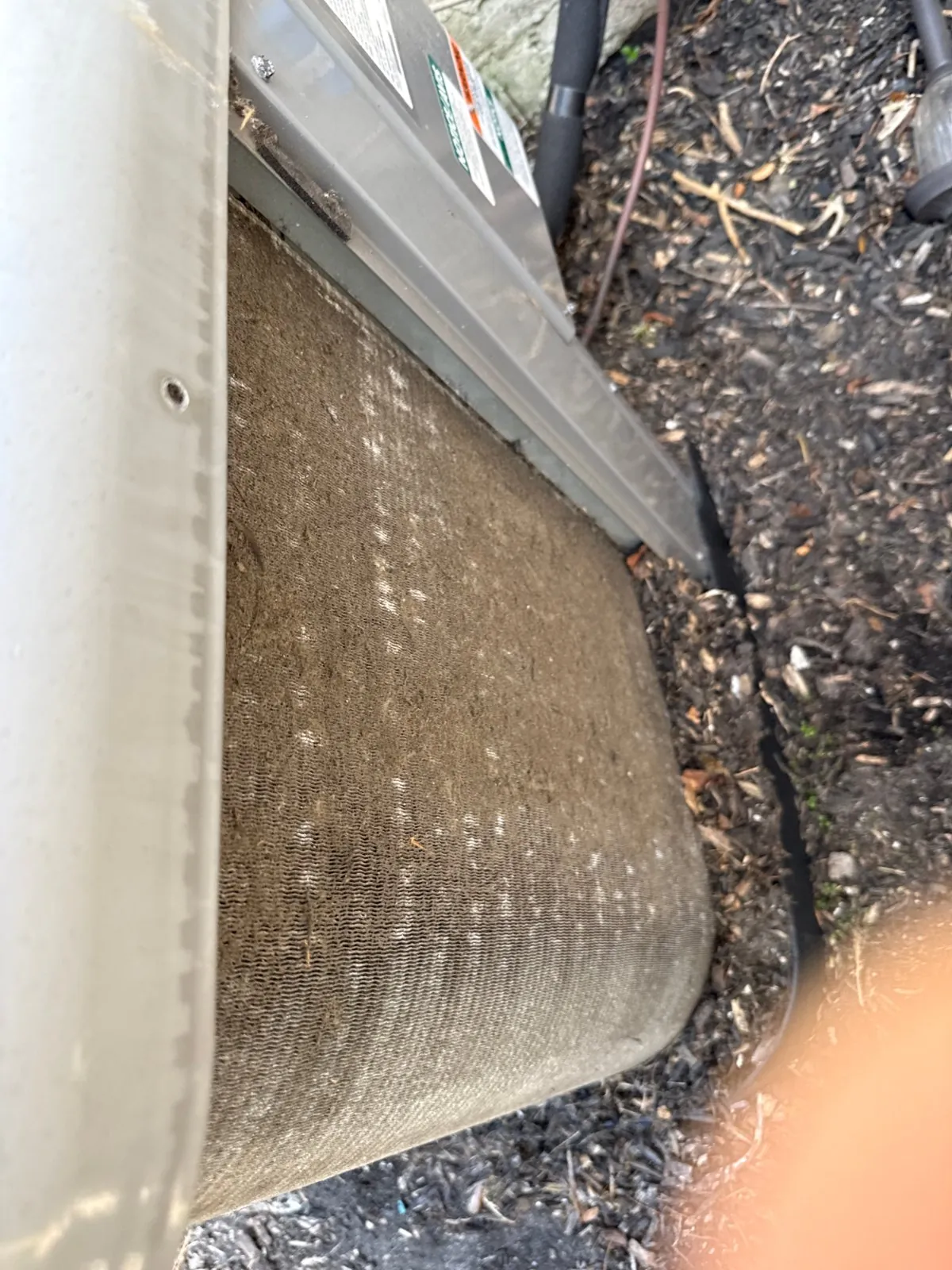 Condenser coil fins packed with debris, Farmingdale NY