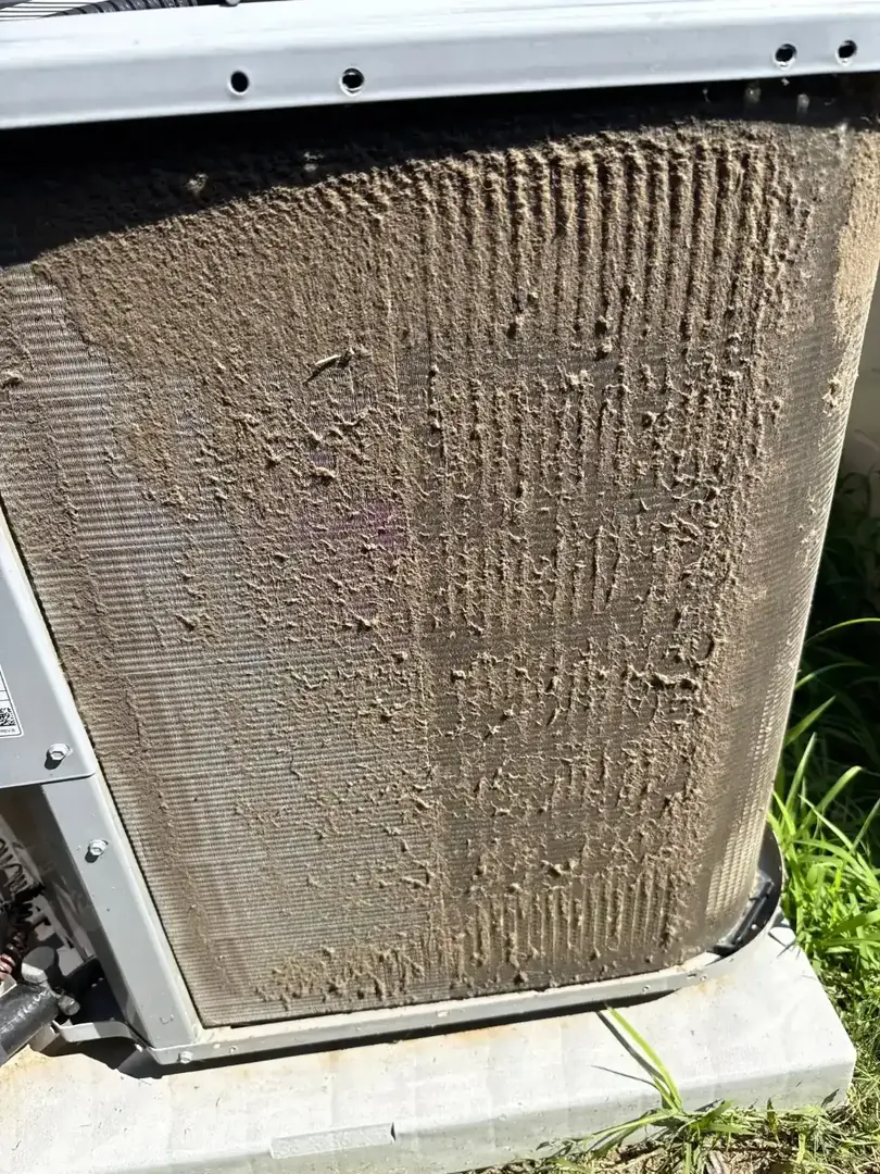 Condenser coil coated in dirt before cleaning, Hauppauge NY