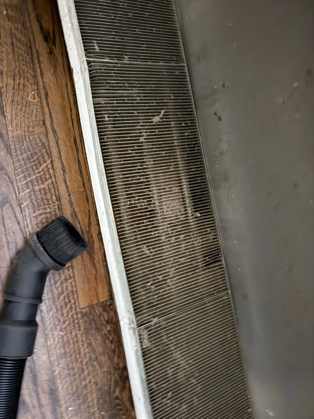 Vacuuming the baseboard fin coil, Huntington NY