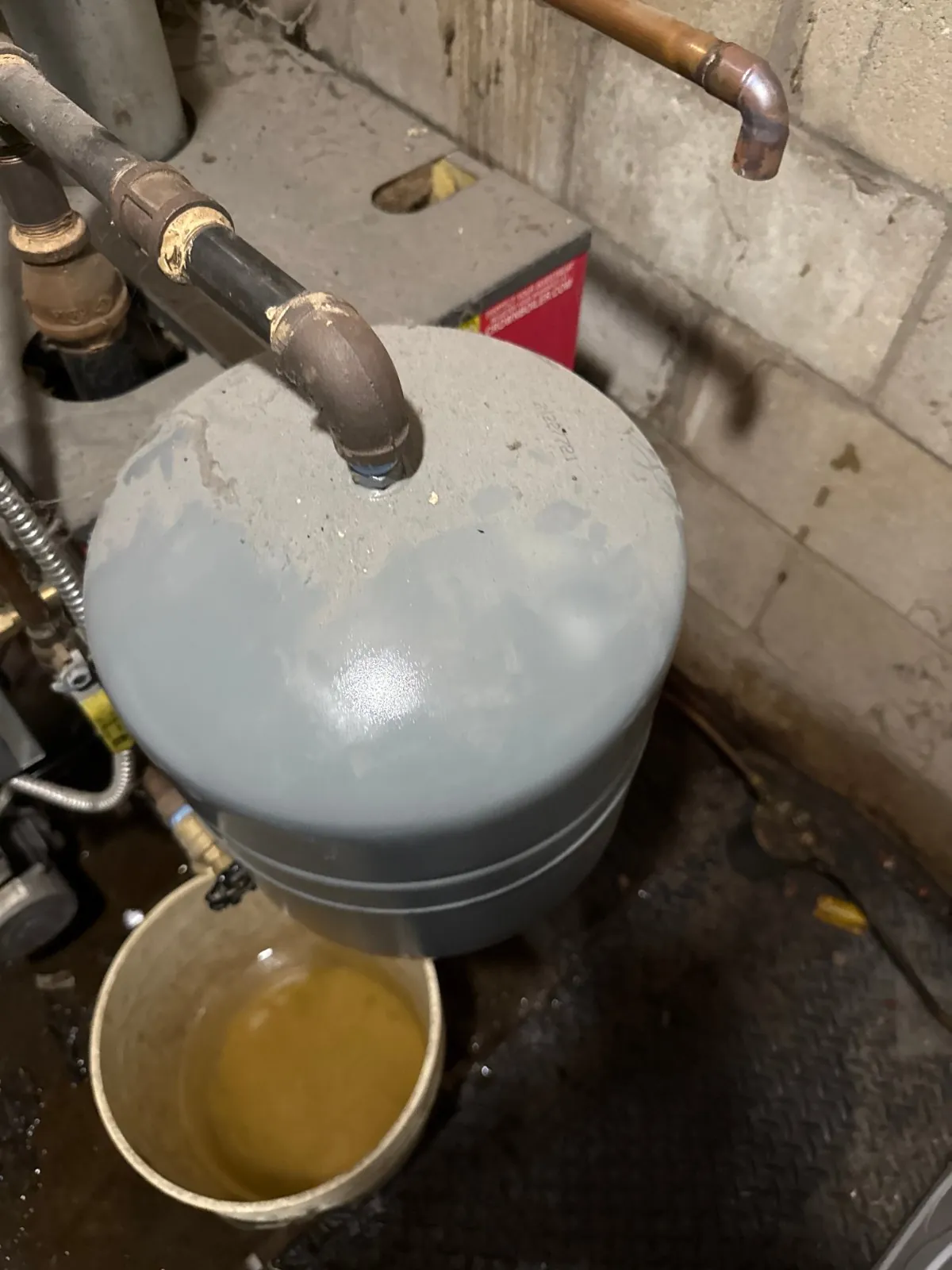 Expansion tank draining during the boiler repair