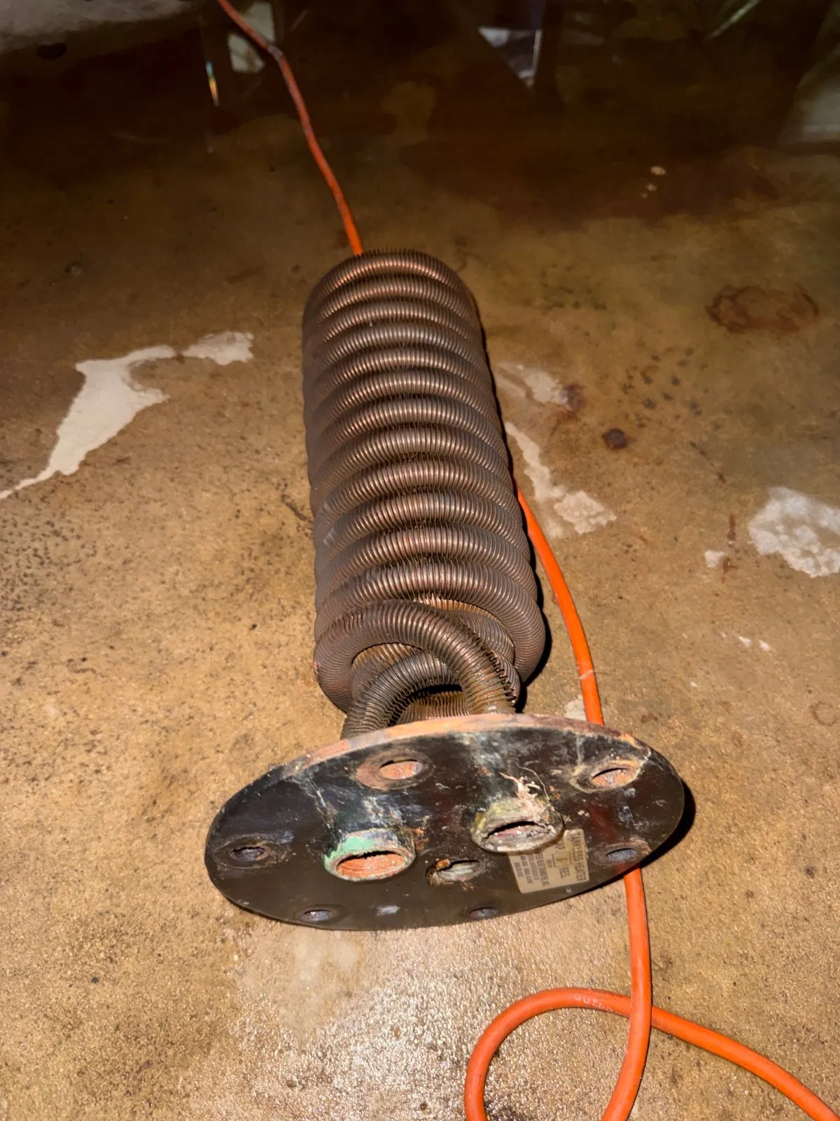 Old domestic hot water coil removed from the boiler