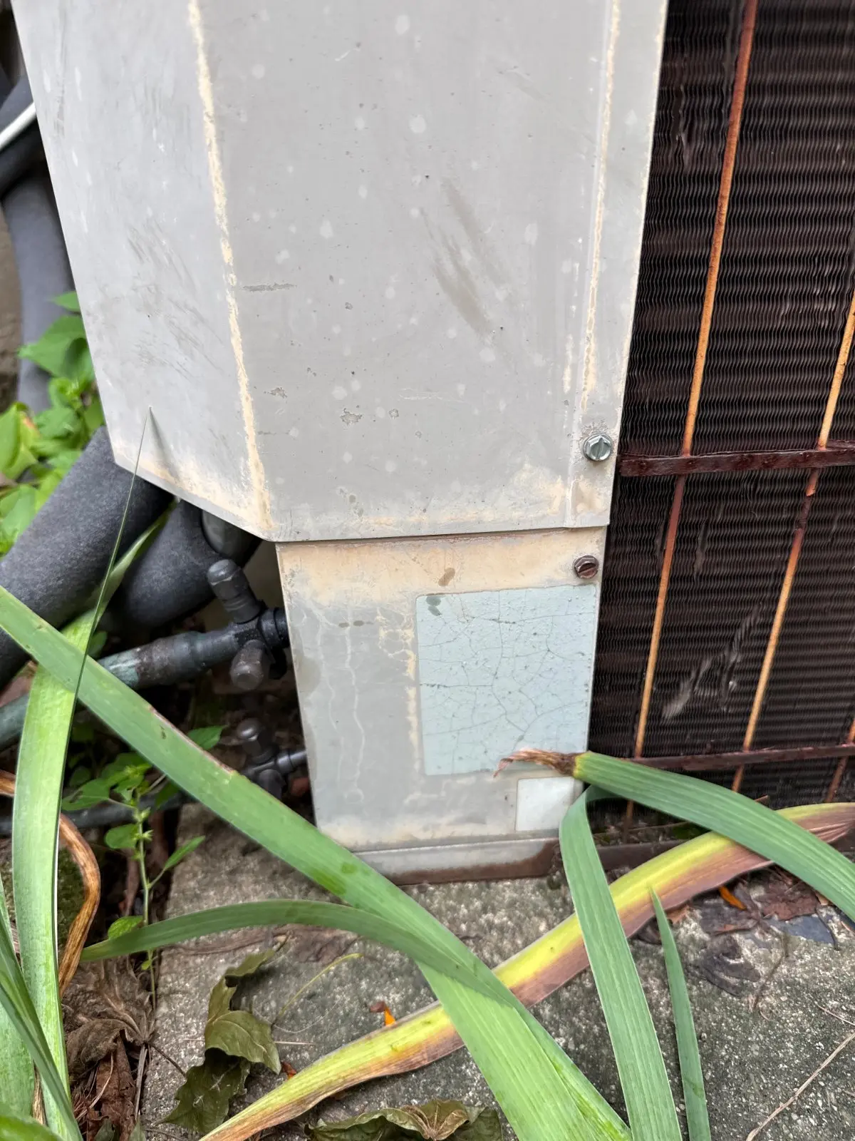 Condensate and refrigerant lines at the outdoor unit, Melville NY