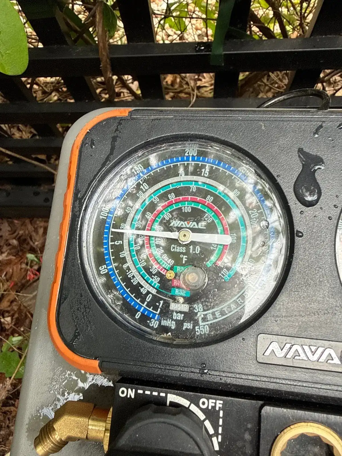 Manifold gauges reading system pressures after the repair, Northport NY