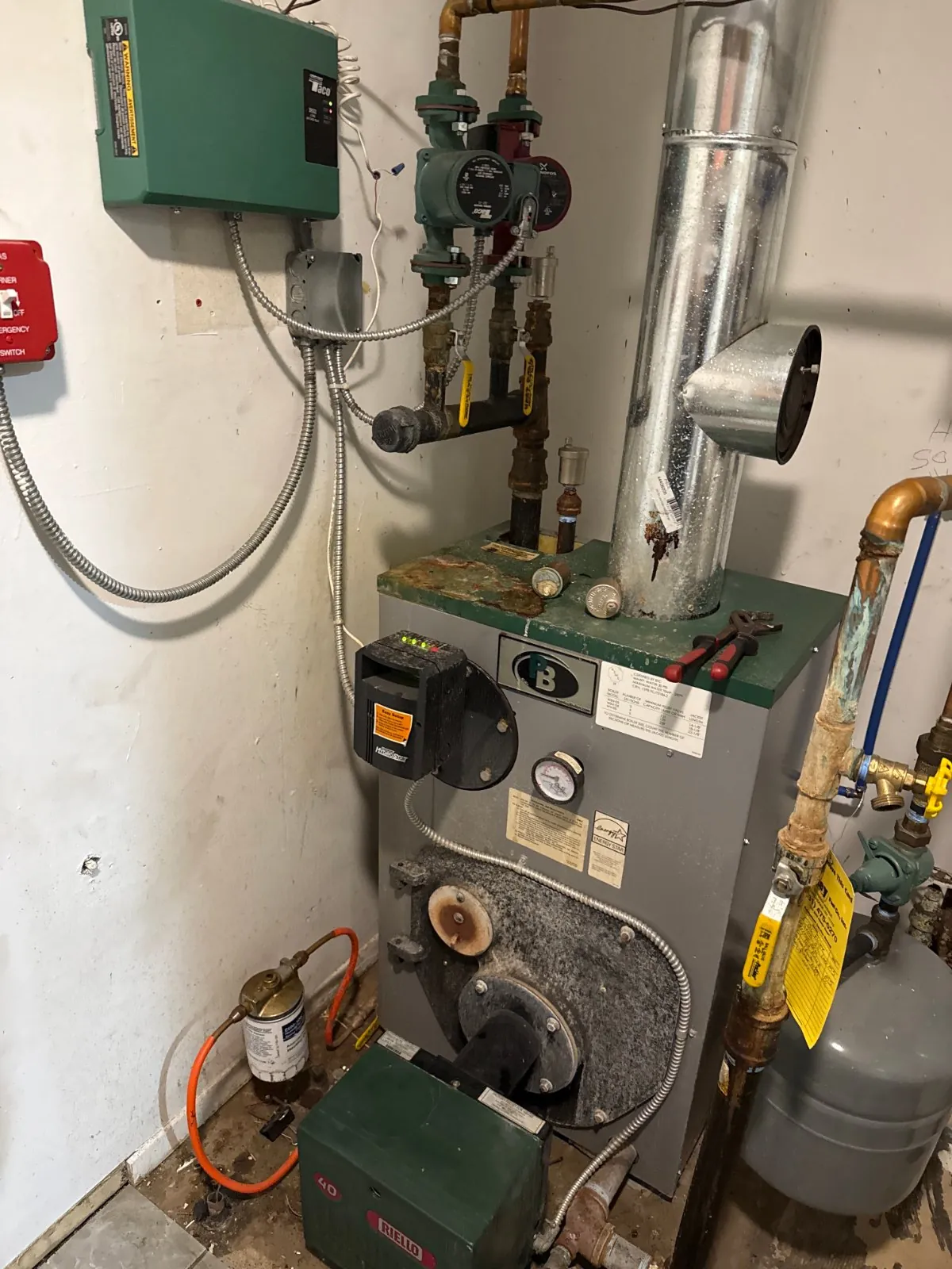 Oil-fired boiler and controls in a basement, Stony Brook NY