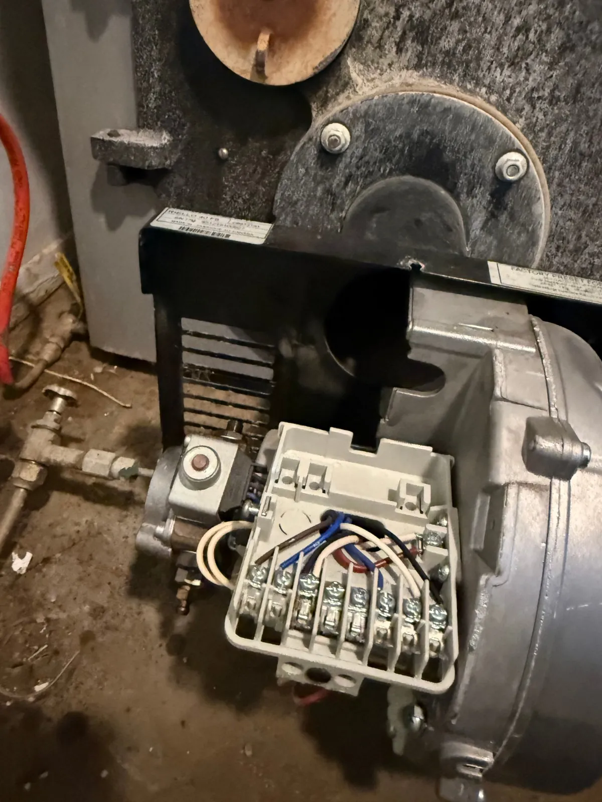 Oil burner with its cover off for cleaning, Stony Brook NY