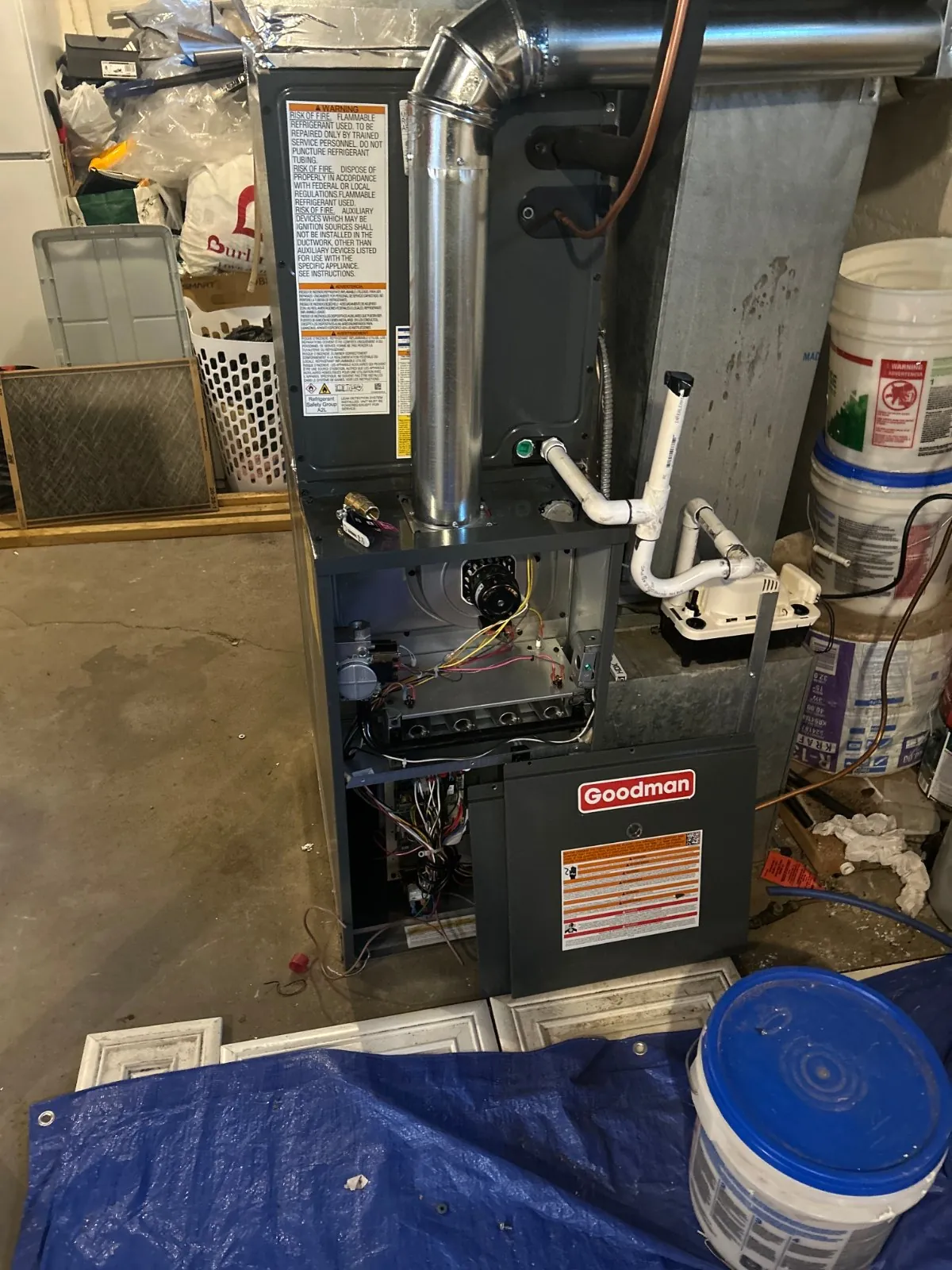 New Goodman gas furnace installed in a West Babylon basement