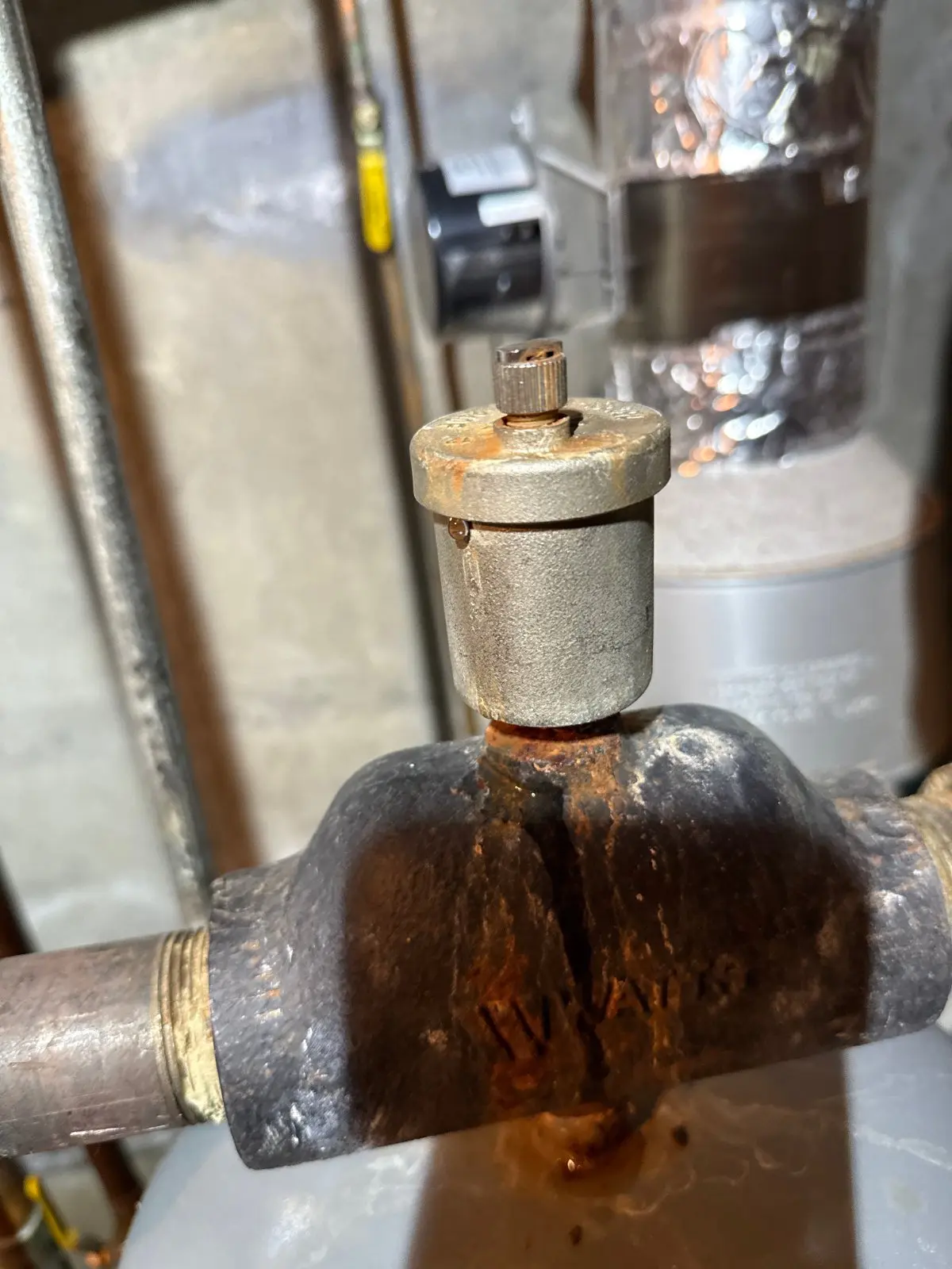 Corroded air bleeder on the heating piping before replacement, Woodbury NY